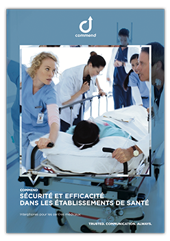 Commend: Healthcare Security & Efficiency Medical staff rushing a patient on a stretcher in a hospital, showcasing a Commend healthcare communication system.