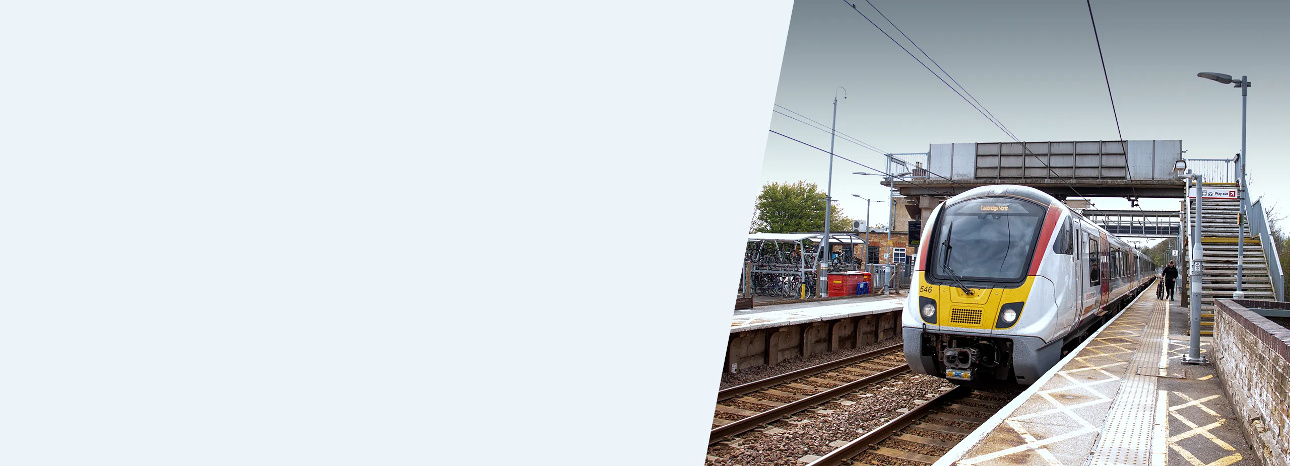 Passenger train at a railway station with modern communication system