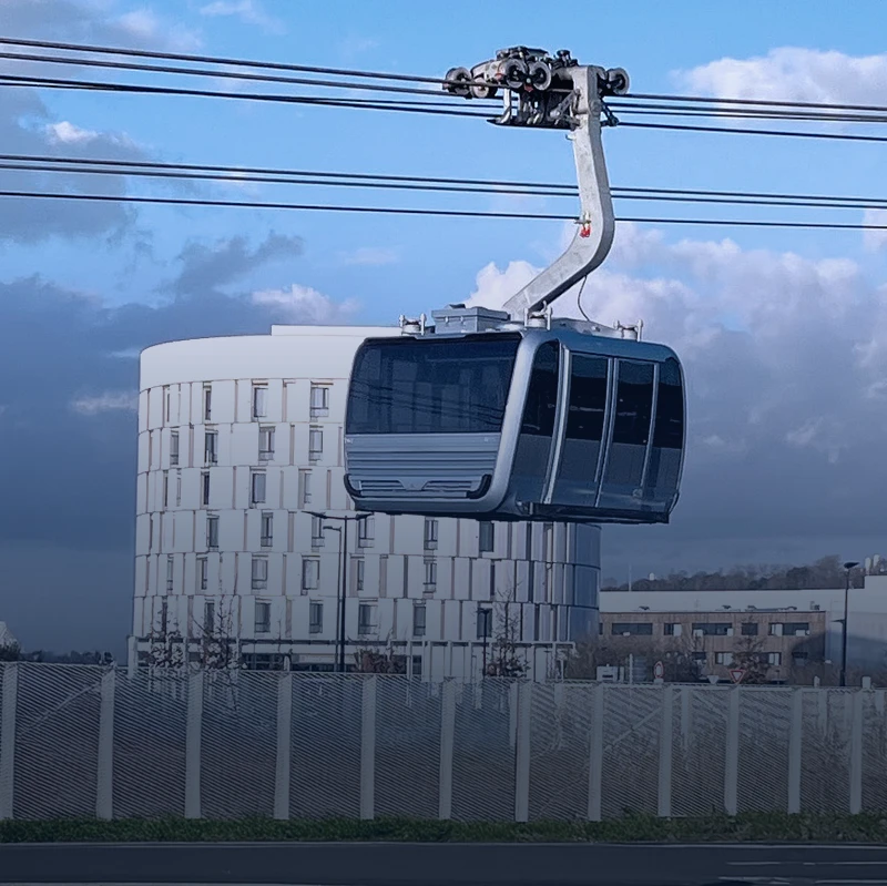 Modern cable car with integrated communication system for safety and passenger coordination
