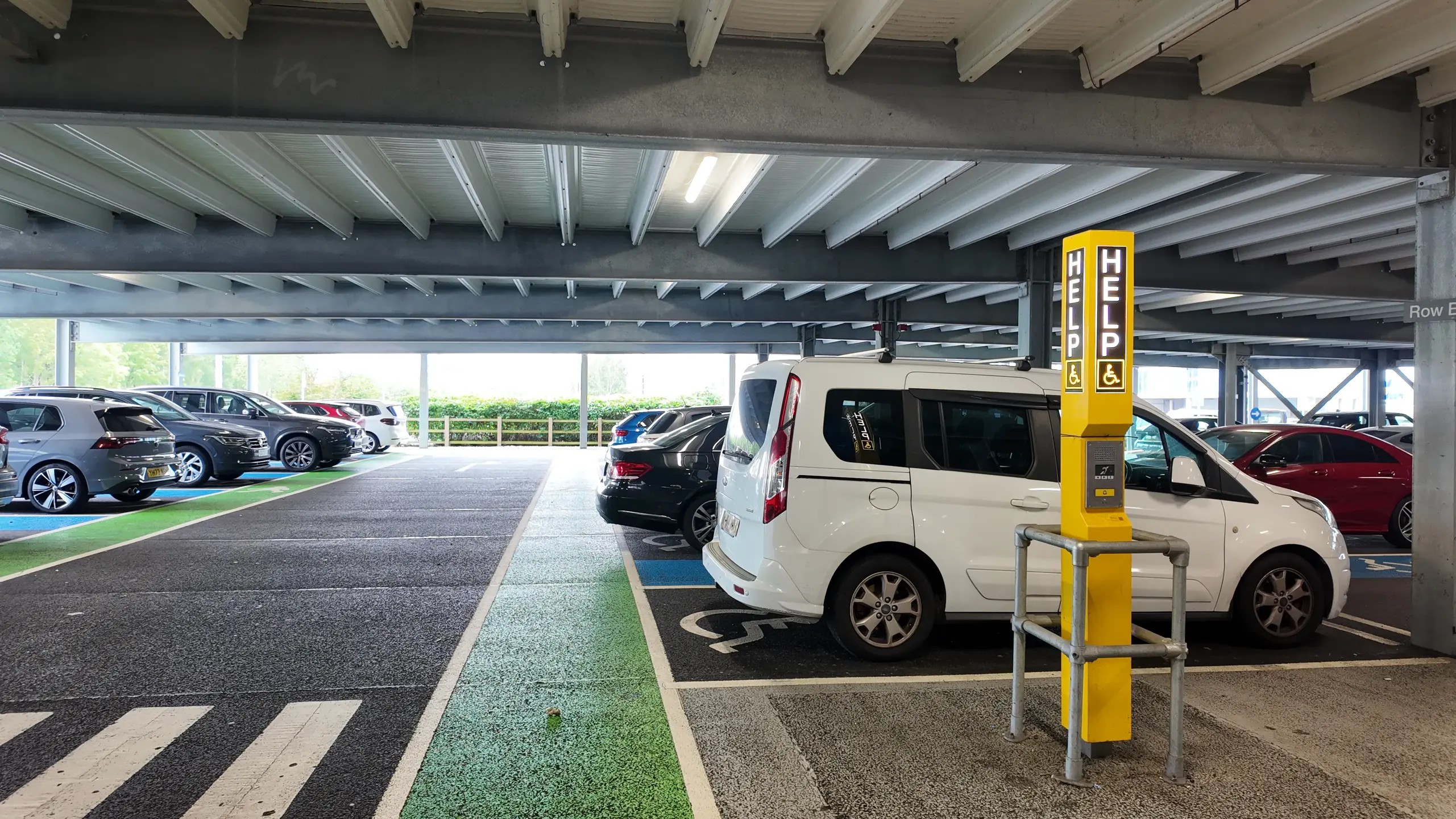 Accessible parking area with help point and intercom system in airport car park