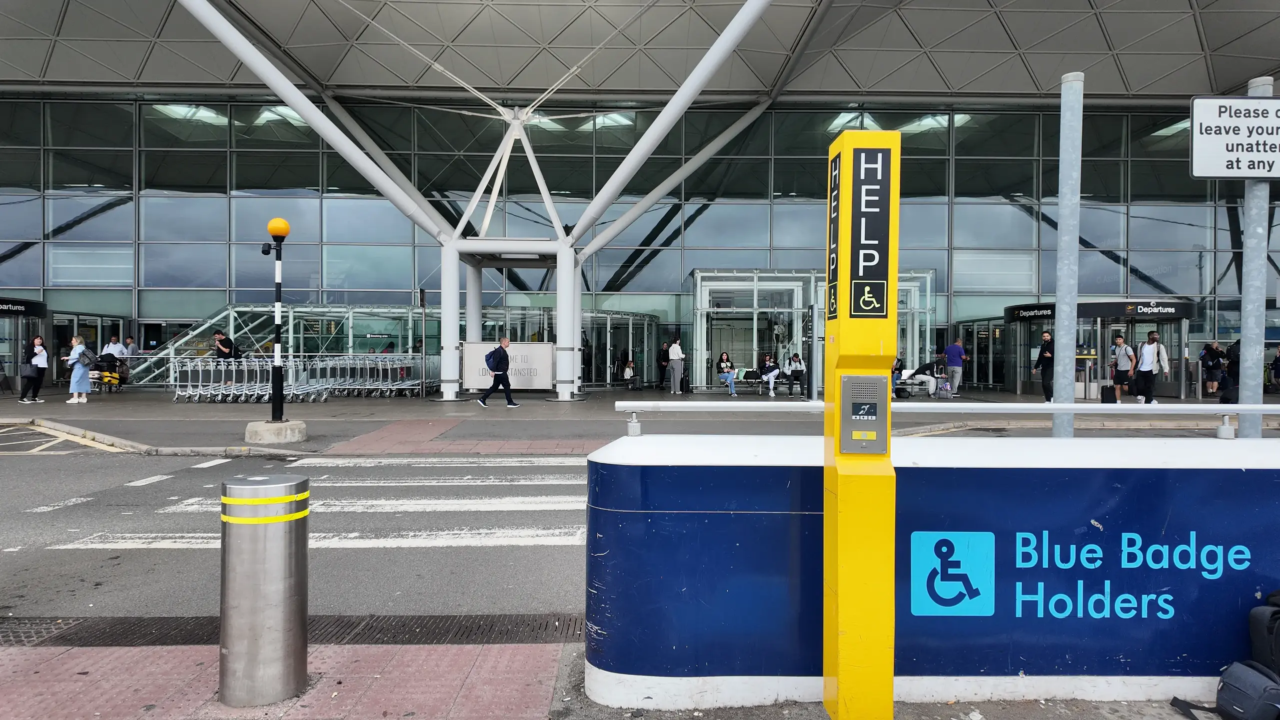 Accessible help point with intercom system outside airport departures area