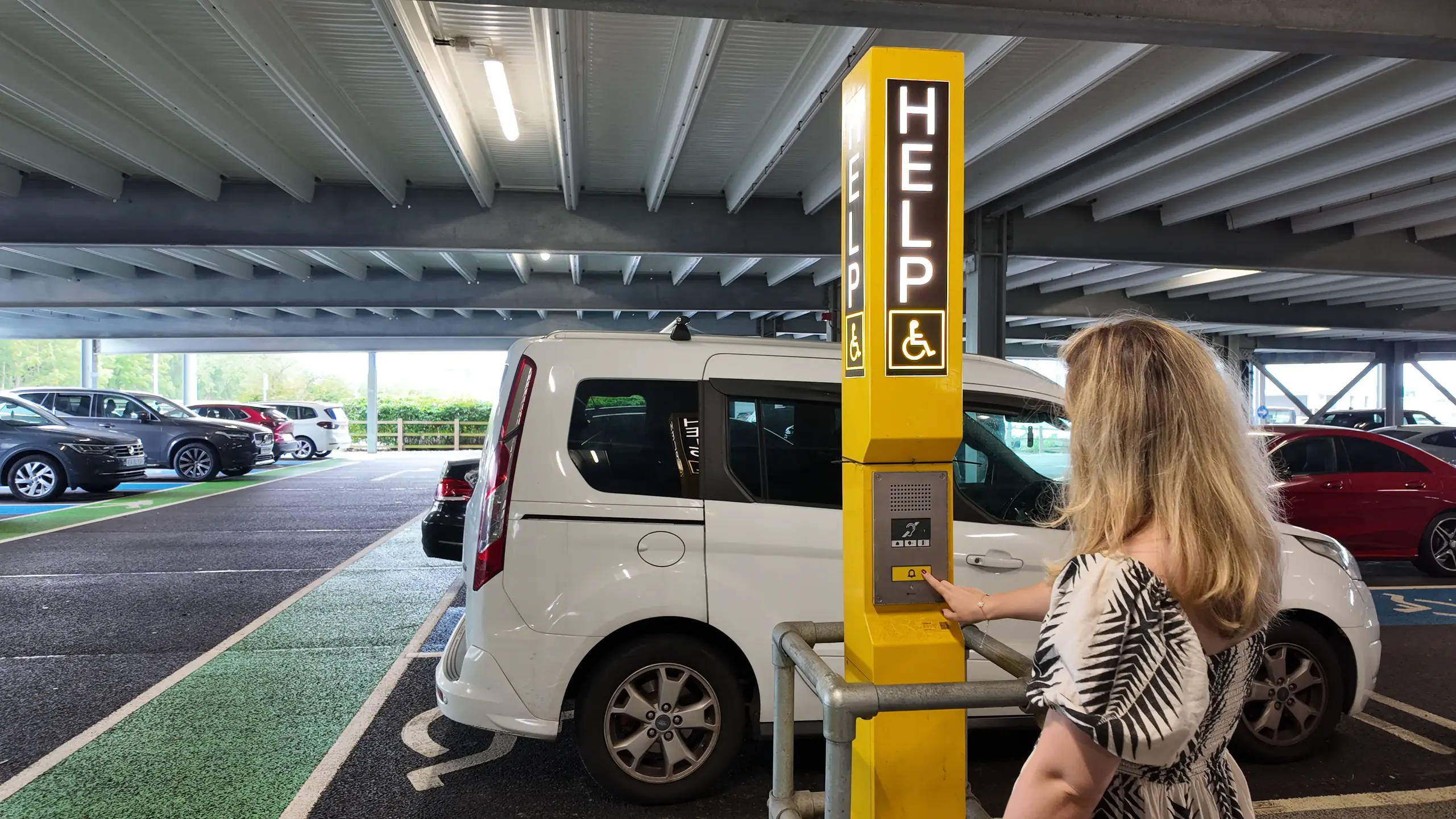 Accessible parking help point with intercom system in airport car park