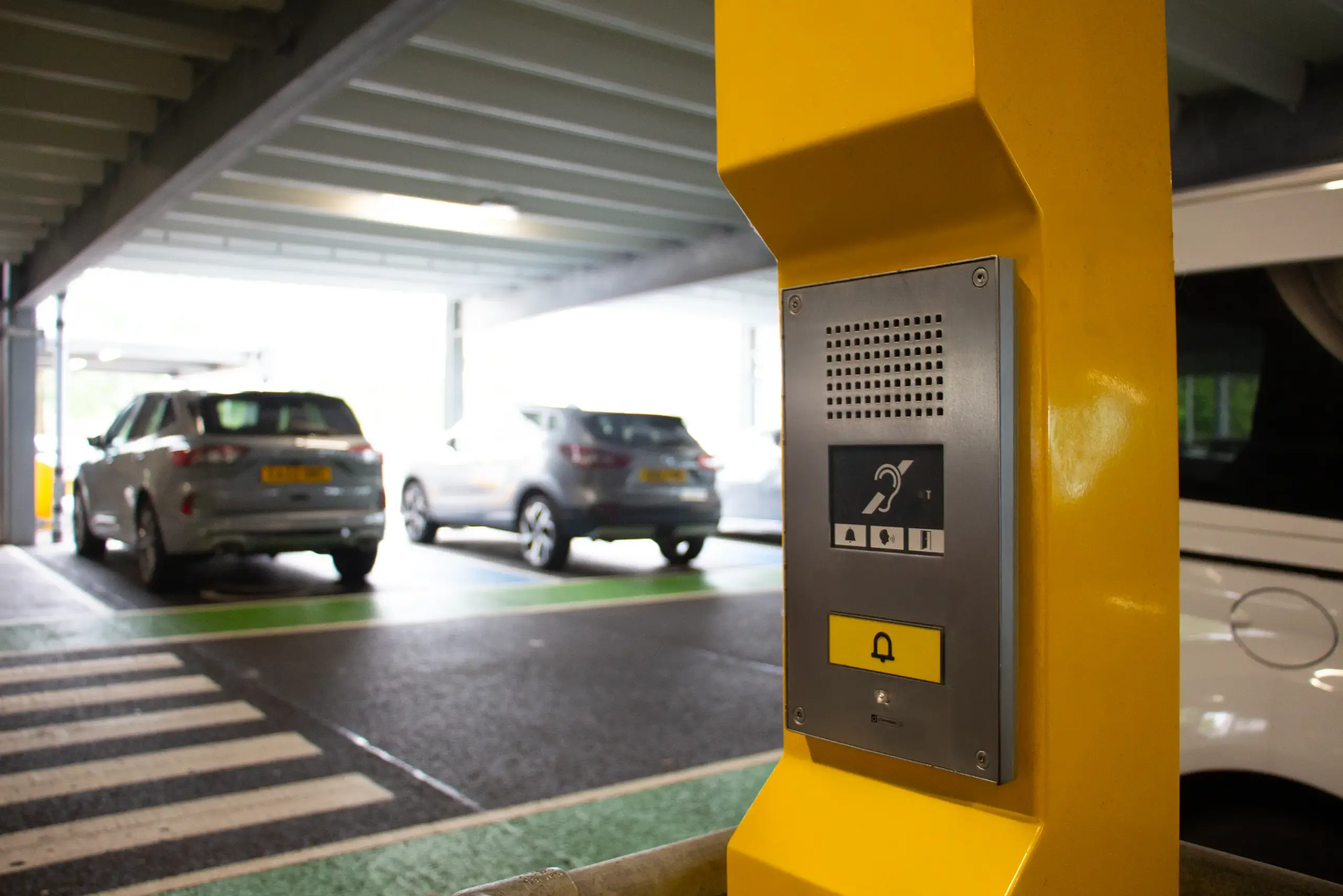 Close-up of accessible help point intercom system in airport car park