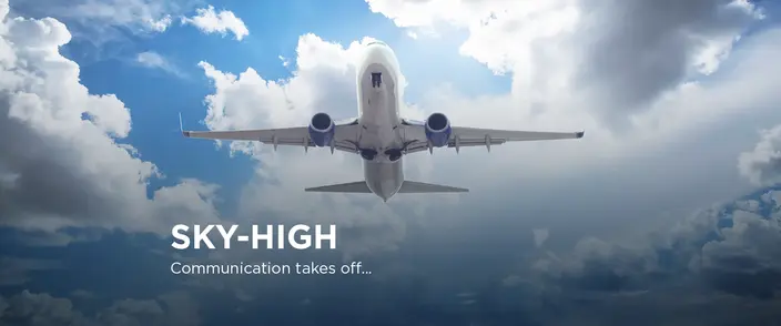 White airplane ascending into a bright blue and cloudy sky with "SKY-HIGH Communication takes off..." text.